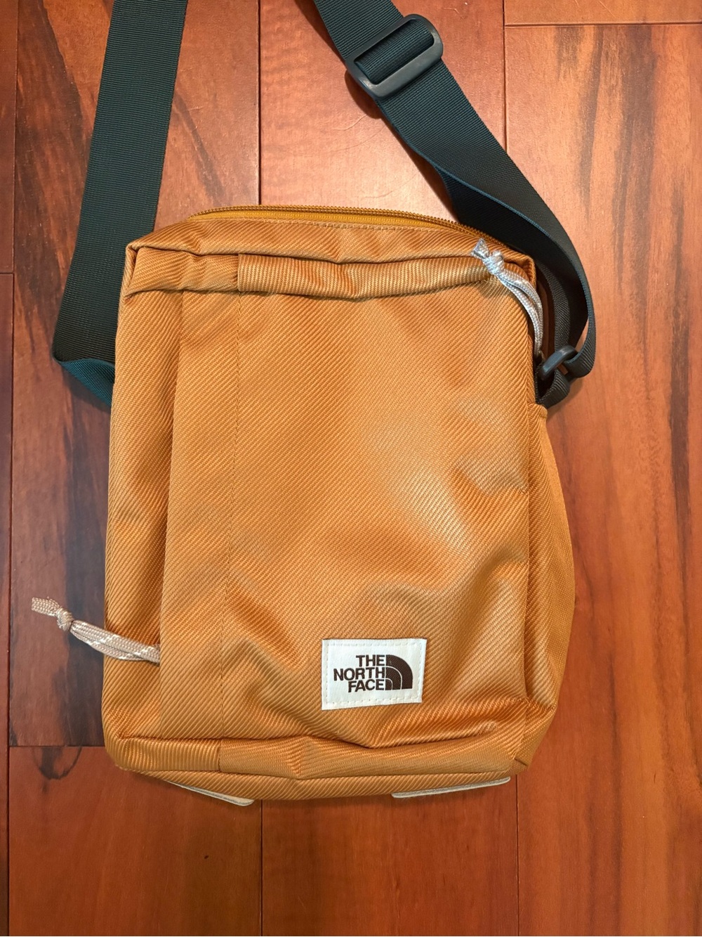 The North Face crossbody Bag in Tan with green Strap